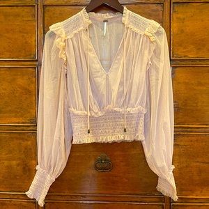 Free People dusty pink mesh blouse.